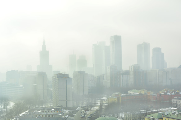 A view of a city skyline with a heavy layer of smog